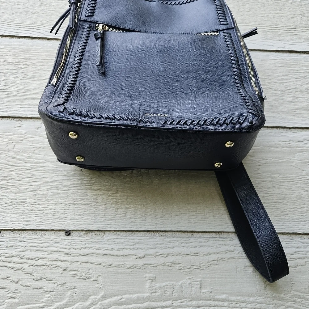 Calpak Kaya black faux leather laptop travel backpack
